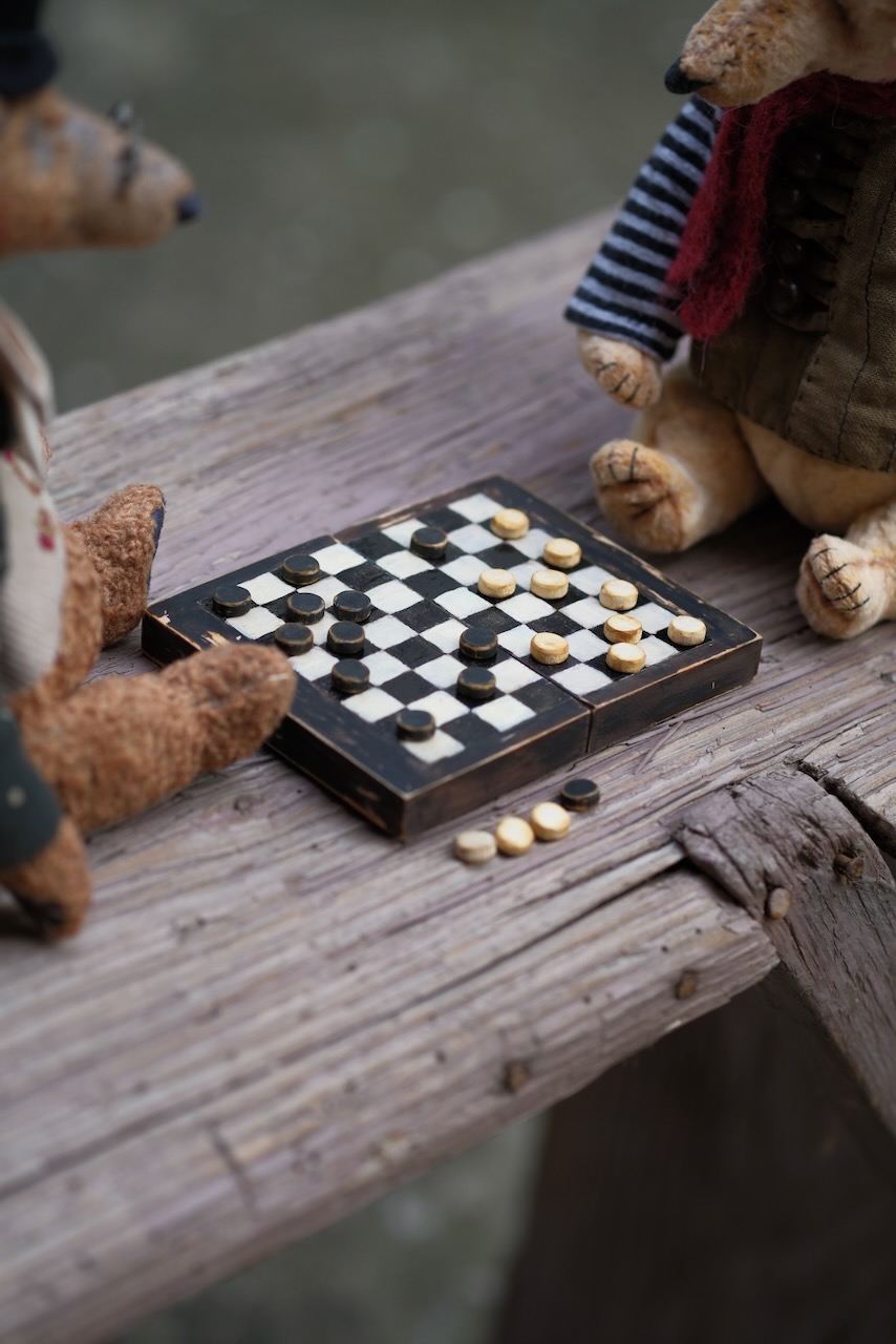 Bears playing checkers